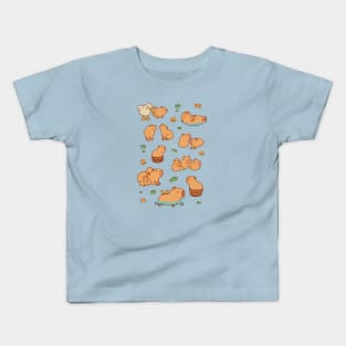 Many capybaras swimming with oranges, chilling and relaxing Kids T-Shirt